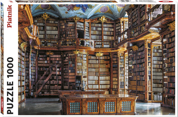 A jigsaw puzzle box featuring an intricate interior of the Library Monastery St. Florian. The image showcases grand wooden bookshelves lined with numerous books, ornate architectural details, and a beautifully painted ceiling. The setting exudes a rich historical ambiance, perfect for puzzle enthusiasts who appreciate detailed art and architecture.