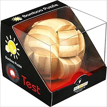 The Ball Puzzle by fridolin is a mechanical puzzle made of bamboo, presented in a transparent display box. The puzzle features a spherical design with interlocking wooden pieces that challenge the user’s problem-solving skills. The packaging is bright and includes a logo stating 'IQ Test', appealing to those who enjoy brain teasers.