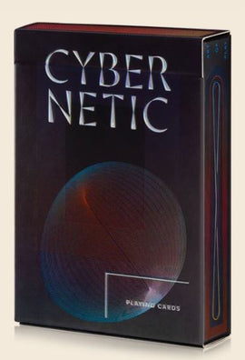 A sleek, modern box of Cybernetic Playing Cards by Art of Play featuring a vibrant, abstract circular design in shades of blue and red on a dark background. The box has the text 'CYBER NETIC' prominently displayed at the top, indicating its futuristic theme, along with the text 'PLAYING CARDS' at the bottom.
