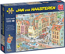 The Missing Piece jigsaw puzzle by Jan van Haasteren features a vibrant and humorous illustration of a busy city scene with various characters and detailed buildings. This 1000-piece puzzle showcases unique comic art, inviting puzzle enthusiasts to enjoy both the challenge and the charming visuals.