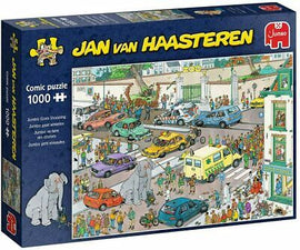 Jumbo Goes Shopping jigsaw puzzle by Jan van Haasteren, featuring a vibrant comic scene of a busy shopping area filled with people, cars, and an elephant in the foreground. The box showcases the colorful artwork and highlights that it is a 1000 piece puzzle.