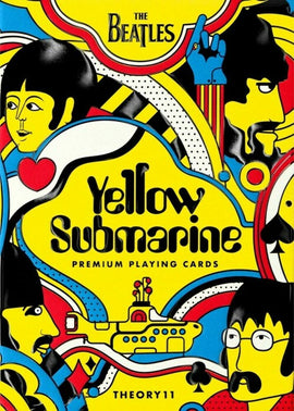 The Yellow Submarine Playing Cards by Theory 11, featuring vibrant and colorful artwork inspired by The Beatles. The design includes whimsical illustrations of the iconic submarine and stylized depictions of the band members, set against a bright yellow background. These premium playing cards are ideal for fans of The Beatles and card game enthusiasts alike, perfect for both collection and play.
