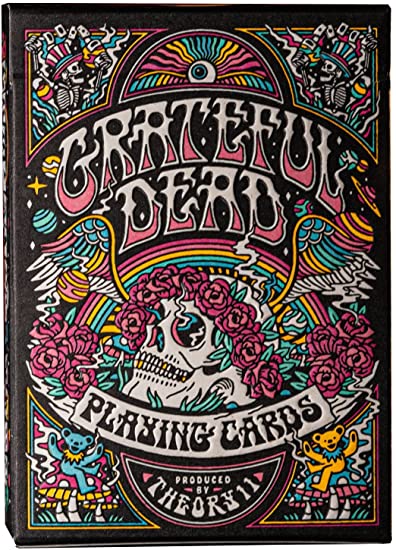A beautifully illustrated deck of Grateful Dead Playing Cards by Theory 11, featuring vibrant colors, roses, a skull, and iconic band imagery, all in a decorative box.