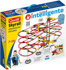 Quercetti Skyrail Ottovolante Elevator DIY kit with a colorful track system. The packaging showcases a boy playing with the elevator kit, which consists of 360 pieces, including tracks and gears. The design highlights the mechanical action of the elevator as it lifts marbles along the spiral tracks, offering educational benefits for ages 7 to 14.