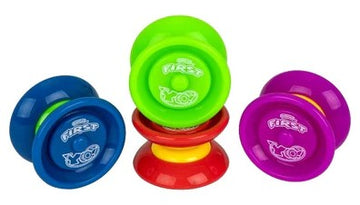 Colorful set of First Yo! Yo-Yos by Duncan displayed in a stack. The yo-yos feature bright colors including blue, green, purple, and red with a smooth, glossy finish, perfect for beginners and fun for all ages.