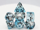 A colorful Lucky Koi Fish RPG dice set featuring six polyhedral dice in various shapes, including a d20, d12, and d10, with a translucent blue resin finish and black numbers. The dice showcase a unique design with koi fish details embedded within the resin, perfect for tabletop role-playing games. Ideal for gamers looking to add a touch of luck and style to their gaming experience.