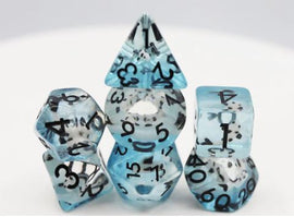 A colorful Lucky Koi Fish RPG dice set featuring six polyhedral dice in various shapes, including a d20, d12, and d10, with a translucent blue resin finish and black numbers. The dice showcase a unique design with koi fish details embedded within the resin, perfect for tabletop role-playing games. Ideal for gamers looking to add a touch of luck and style to their gaming experience.