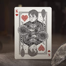 A detailed playing card featuring Harry Potter as the King of Hearts. The design showcases Harry with round glasses and a broomstick, highlighting intricate patterns and vibrant colors.