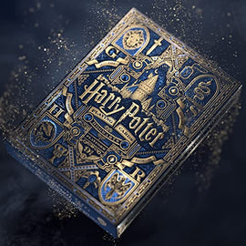 A beautifully designed deck of Harry Potter playing cards by Theory 11, featuring intricate blue and gold artwork, depicting various Hogwarts symbols and characters, perfect for fans and collectors.