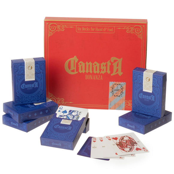 Conasta Bonanza card game by Brybelly featuring six decks of playing cards designed for the 'Hand and Foot' game. The vibrant red box displays the title prominently, with multiple blue decks beside it, showcasing various card designs including a queen and other playing cards.