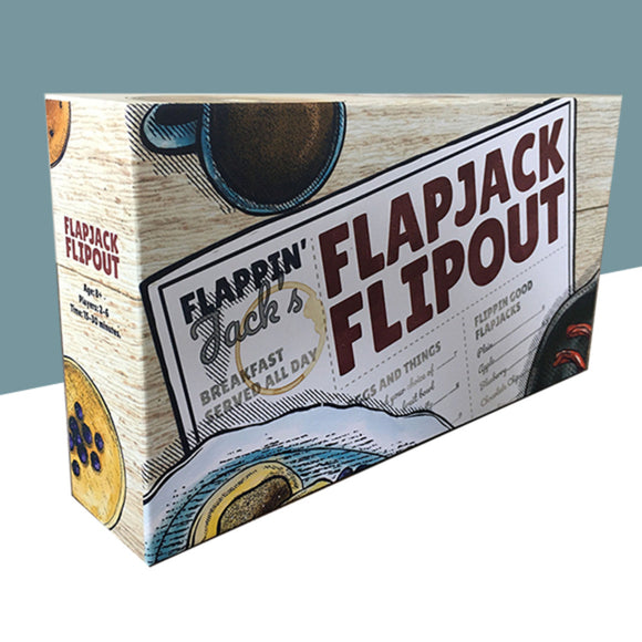 The Flapjack Flipout game box by Mind the Gap Studios features vibrant graphics of pancakes and a coffee cup. It is designed for players aged 8 and above, accommodating 2-4 players with a playing time of approximately 30 minutes. The packaging showcases a playful breakfast theme, enticing players for a fun experience.