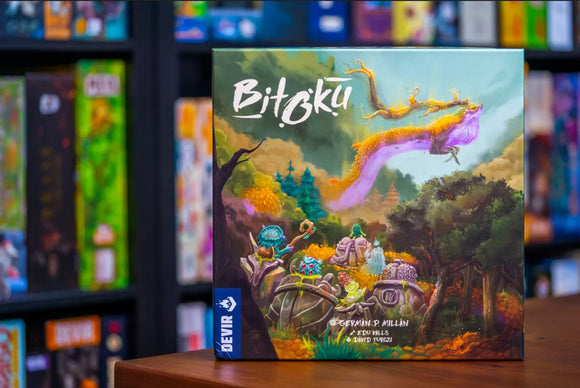 The product image features the game 'Bitoku' by Devir Games, showcasing its colorful box art, which depicts an enchanting forest scene with a vibrant spirit dragon and mystical creatures. The intricate illustrations invite players into a world of adventure and strategy, perfect for game nights with family and friends.