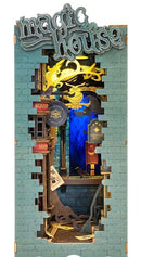 The Magic House DIY Book Nook by Robotime is a creatively designed miniature scene featuring a whimsical interior with colorful banners, books, and magical elements. Detailed walls and a playful dragon motif create a charming atmosphere perfect for book lovers and DIY enthusiasts alike. The intricate design invites users to assemble their own magical space.