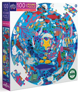 Colorful Under the Sea Round Puzzle by Eeboo, featuring a vibrant underwater scene filled with various marine life such as fishes, starfish, and sea plants. This 100-piece jigsaw puzzle is designed for ages 5 and up and comes in a circular shape, enhancing puzzle-solving fun.