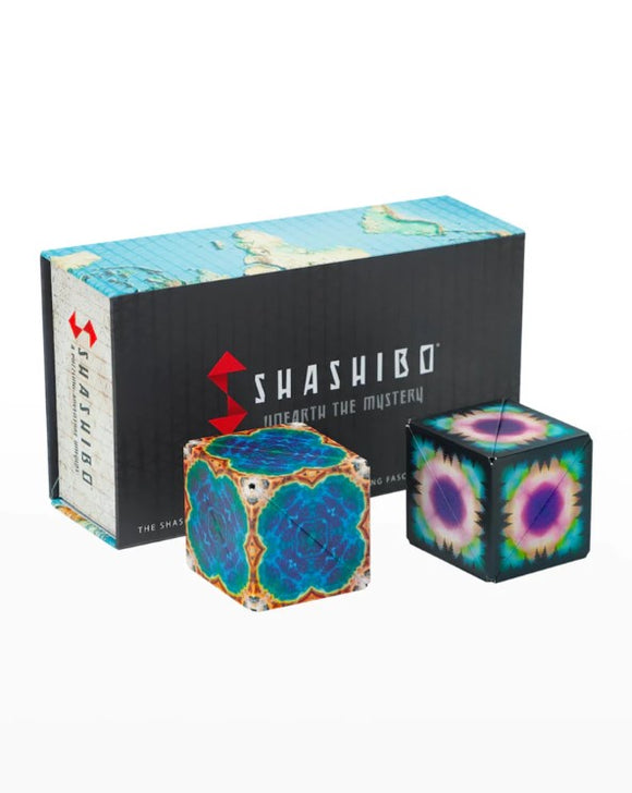 The Shashibo Earth & Moon 2-pack features two colorful mechanical puzzles, showcasing intricate designs. It's packaged in a stylish box that highlights the mysterious theme, perfect for puzzlers looking for a unique challenge.