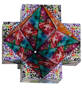 Cubendi: Scribble is a vibrant mechanical puzzle featuring a colorful, geometric design. The puzzle consists of interlocking pieces that challenge users to solve it through spatial reasoning and creativity.