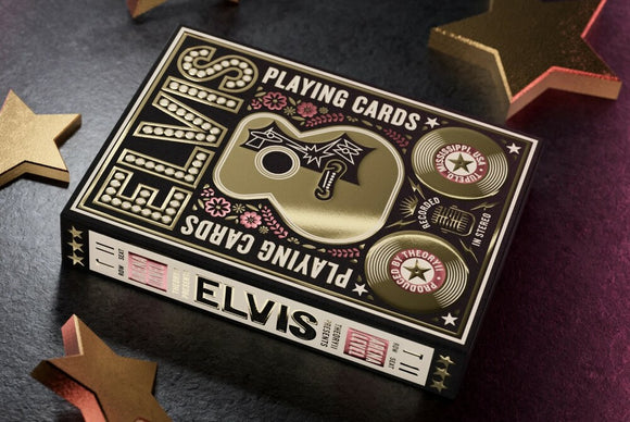Elvis Playing Cards by Theory 11 featuring a beautifully designed box with intricate graphics. The box showcases Elvis's iconic imagery, including a guitar motif and decorative floral elements. The color scheme includes gold and black, enhancing its vintage appeal. Ideal for card games and collectors alike.