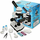 Microscope 39 Piece Set by Thin Air Brands, featuring a sturdy microscope with a variety of accessories including slides, specimen containers, and preparation tools. The microscope is used for scientific exploration and educational purposes, packaged attractively in a colorful box.