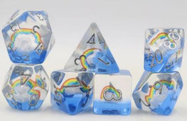 A Beautiful Day RPG Dice Set by Foam Brain displayed on a white background. The set includes various polyhedral dice featuring a design with clouds and vibrant rainbow colors. Each die showcases clear resin with colorful rainbow and silver numbering, making them visually appealing for tabletop gaming.