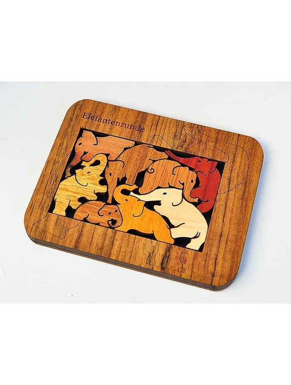 The Elefanten G-10 mechanical puzzle by Jean Claude features a beautifully crafted wooden base with colorful animal-shaped pieces. Each piece fits snugly, forming a vibrant design that showcases different animals. The puzzle is designed for engagement and fun, making it a perfect gift for both children and adults who enjoy mechanical challenges.