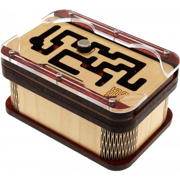 Two Key Box Puzzle Box designed by Jean-Claude Constantin. This intricate mechanical puzzle features a stylish wooden body with an overlay of clear acrylic. The top of the box showcases a maze-like design, challenging users to discover the hidden mechanism. It has a smooth finish and unique detailing, making it an elegant addition to any puzzle lover's collection.