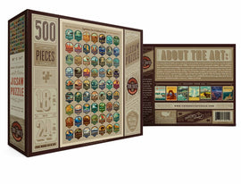National Parks Emblems jigsaw puzzle by True South Puzzles. Features 500 pieces in a finished size of 18 x 24 inches. Box design showcases various national park emblems and vibrant artwork with informative details on the reverse.