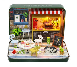 A colorful DIY summer theater kit in a tin from Guangzhou Hongda Craft Co., Ltd. The scene includes miniature furniture, detailed decorations, plants, and a lit up storefront, creating a charming cozy atmosphere for crafting and creativity.