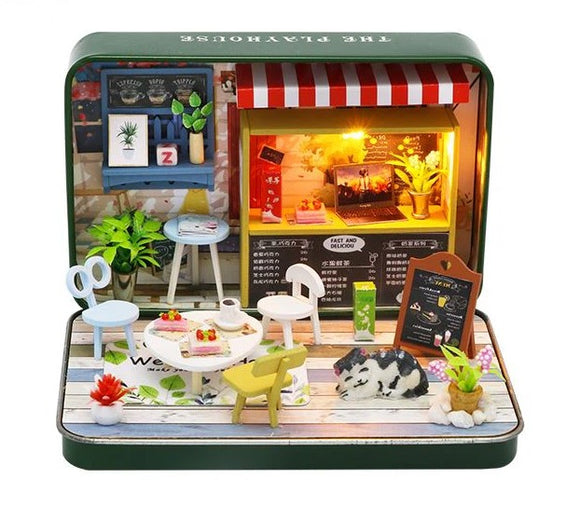 A colorful DIY summer theater kit in a tin from Guangzhou Hongda Craft Co., Ltd. The scene includes miniature furniture, detailed decorations, plants, and a lit up storefront, creating a charming cozy atmosphere for crafting and creativity.