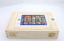 Artifact Wooden Puzzles presents the Gunfight on the Roof jigsaw puzzle by Jim Flora, featuring a colorful illustration on the box cover. The wooden box is elegantly crafted with the title and designer's name inscribed on the side, showcasing 416 pieces suitable for puzzle enthusiasts and families.