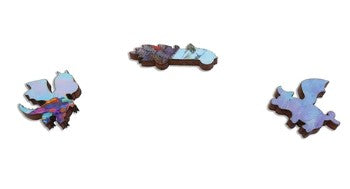 Three intricately designed wooden jigsaw puzzle pieces from the Floating Town puzzle by Roch Urbaniak. Each piece features vibrant colors and unique shapes, showcasing the whimsical and artistic nature of this creative puzzle.