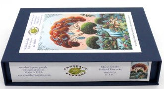 A jigsaw puzzle titled 'Pride of Peacocks' by Marie Amalia, created by Artifact Wooden Puzzles. The image shows the puzzle box featuring vibrant, detailed artwork of peacocks amidst whimsical trees and lush greenery. The box is navy blue with a clear depiction of the completed puzzle on the front, emphasizing its artistic design.