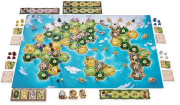 Catan Dawn of Humankind game board displayed with hexagonal tiles in vibrant colors, featuring land, sea, and various resources available for players. Includes game pieces, cards, and dice, set for an engaging strategic gameplay experience.