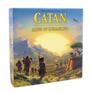 Catan Dawn of Humankind game box featuring a colorful landscape with mountains, a river, and prehistoric figures exploring. The sun rises in the background, creating a serene atmosphere.