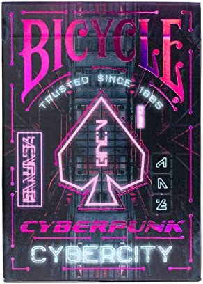 Bicycle Cyberpunk Cybercity playing cards featuring a vibrant, neon-colored design. The deck showcases futuristic elements with a spade symbol and the text 'Trusted Since 1885'. The bold colors and intricate graphics make it perfect for fans of cyberpunk aesthetics.