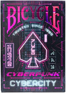 Bicycle Cyberpunk Cybercity playing cards featuring a vibrant, neon-colored design. The deck showcases futuristic elements with a spade symbol and the text 'Trusted Since 1885'. The bold colors and intricate graphics make it perfect for fans of cyberpunk aesthetics.