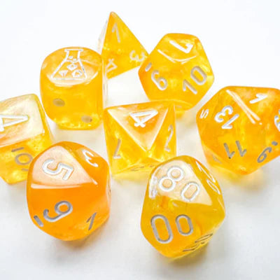 A vibrant set of polyhedral dice in Borealis Canary and White hues. The set includes various shapes like d4, d6, d8, d10, d12, and d20 with clear numbers for easy reading, perfect for tabletop gaming enthusiasts. The translucent yellow dice reflect light beautifully, enhancing their luminous appearance.