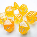 A vibrant set of polyhedral dice in Borealis Canary and White hues. The set includes various shapes like d4, d6, d8, d10, d12, and d20 with clear numbers for easy reading, perfect for tabletop gaming enthusiasts. The translucent yellow dice reflect light beautifully, enhancing their luminous appearance.