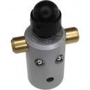 The 'Geburt' mechanical puzzle by Jean-Claude Constantin features a cylindrical design in metallic silver with a black top and brass connectors. The unique puzzle challenges users to navigate mechanical movements to unlock it.