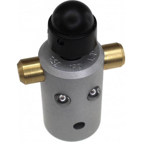 The 'Geburt' mechanical puzzle by Jean-Claude Constantin features a cylindrical design in metallic silver with a black top and brass connectors. The unique puzzle challenges users to navigate mechanical movements to unlock it.
