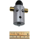 A unique mechanical puzzle titled 'Geburt' by Jean-Claude Constantin. The puzzle features a cylindrical metallic design with playful eyes and various connectors, showcasing intricate mechanics. A ruler is shown at the bottom for size reference.