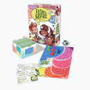 Hive Mind 2nd Edition board game by Calliope featuring colorful game components. Includes game box, player tokens in green, blue, red, and pink, a die, question cards, and a scoring sheet. The artwork depicts playful characters engaging in the game, which emphasizes thinking alike and collaboration among players. Perfect for family game nights or group gatherings.