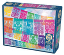 Papel Picado jigsaw puzzle by Cobble Hill featuring vibrant designs inspired by traditional Mexican papel picado art. The box displays colorful cut-out patterns, including skulls and flowers, inviting users to assemble 500+ interlocking pieces, perfect for family fun or individual relaxation. A poster is included for reference.
