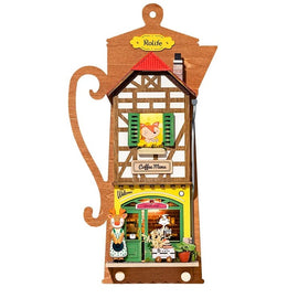 A vibrant 3D wooden model kit titled 'Lazy Coffee House' by Robotime. It features a charming coffee shop design with detailed elements like a welcoming sign, a barista figure, and a sunny window. This DIY kit allows you to assemble an attractive coffee house structure that can be displayed as a decorative piece.