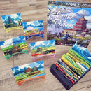 Eternal Palace board game by Alley Cat Games featuring beautifully illustrated cards and a colorful game board. The box showcases vibrant scenery with various landscapes, adding an artistic touch to game night. Perfect for family and friends.