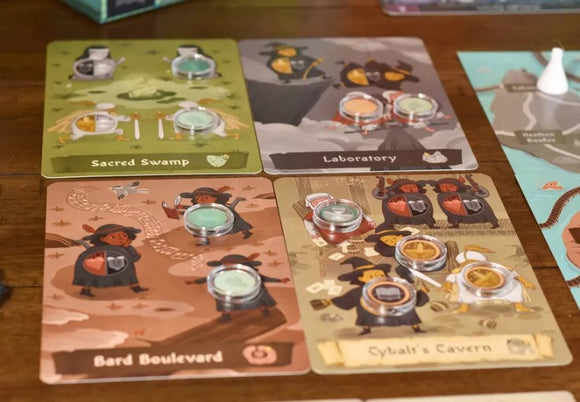 Four Humours game by Adam's Apple Games featuring colorful game boards labeled Sacred Swamp, Laboratory, Bard Boulevard, and Cybal's Cavern. Each board displays quirky characters and game markers, creating an engaging and vibrant gaming experience.