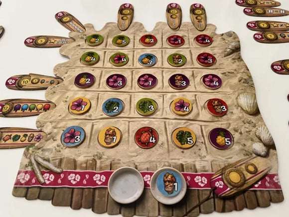The game Fyfe by Burnt Island Games features a colorful game board designed to resemble a sandy beach with various tokens representing flowers, fruits, and other game elements. The board has multiple circular spaces numbered 1 to 5, and comes with two bowls for game pieces. Additionally, several wooden sticks with numbers are positioned around the board, adding to the interactive and strategic gameplay experience.