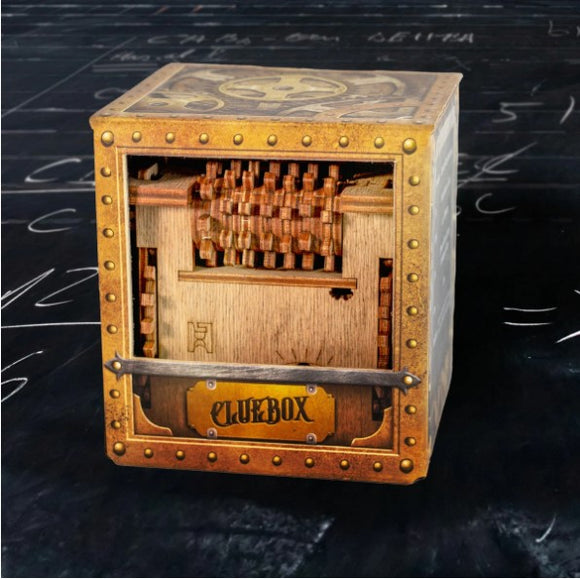 The Cluebox: Schrodinger's Cat by IDventure is a beautifully crafted mechanical puzzle. It features a cube-shaped design with intricate wooden mechanisms visible through a clear front panel. The puzzle is adorned with vintage steampunk elements, including brass accents and bolts, giving it an antique feel. The box is designed as a mind-bending challenge that requires reasoning and problem-solving to unlock it.