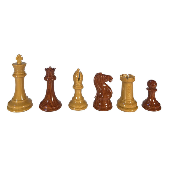 Set of intricately designed chess pieces featuring a 4 1/8" king in wood-grain resin. Pieces include a king, queen, bishop, knight, rook, and pawn. The colors are a mix of light and dark wood tones, showcasing fine craftsmanship.