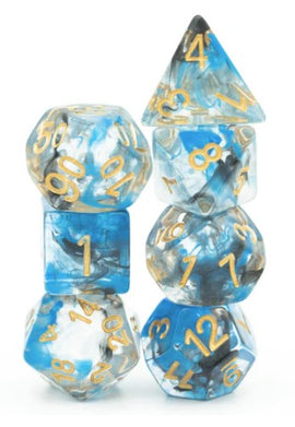 A colorful Smoke Stack RPG Dice Set by Foam Brain, featuring translucent dice in blue and clear colors with gold numbers. The set includes various shapes like a d4, d6, d8, d10, d12, and d20, stacked for display, perfect for tabletop role-playing games.