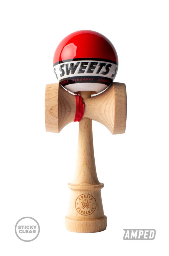 A Starter Red Kendama from Sweets Kendamas, featuring a glossy red ball with a black and white band labeled 'Sweets' on a natural wood handle. The kendama is designed for skill-based play and includes a red string connecting the ball to the handle.